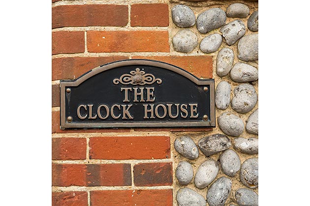 The Clock House's nameplate