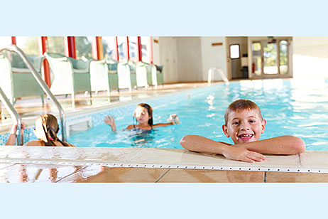Children enjoying the indoor heated swimming pool at Home Farm cottages