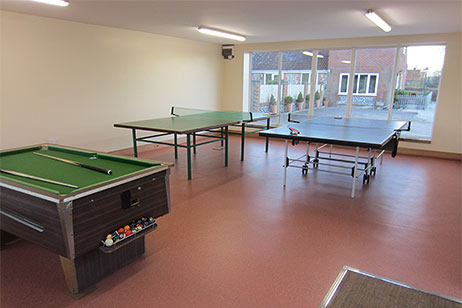 Mini snooker table and table tennis tables, games room